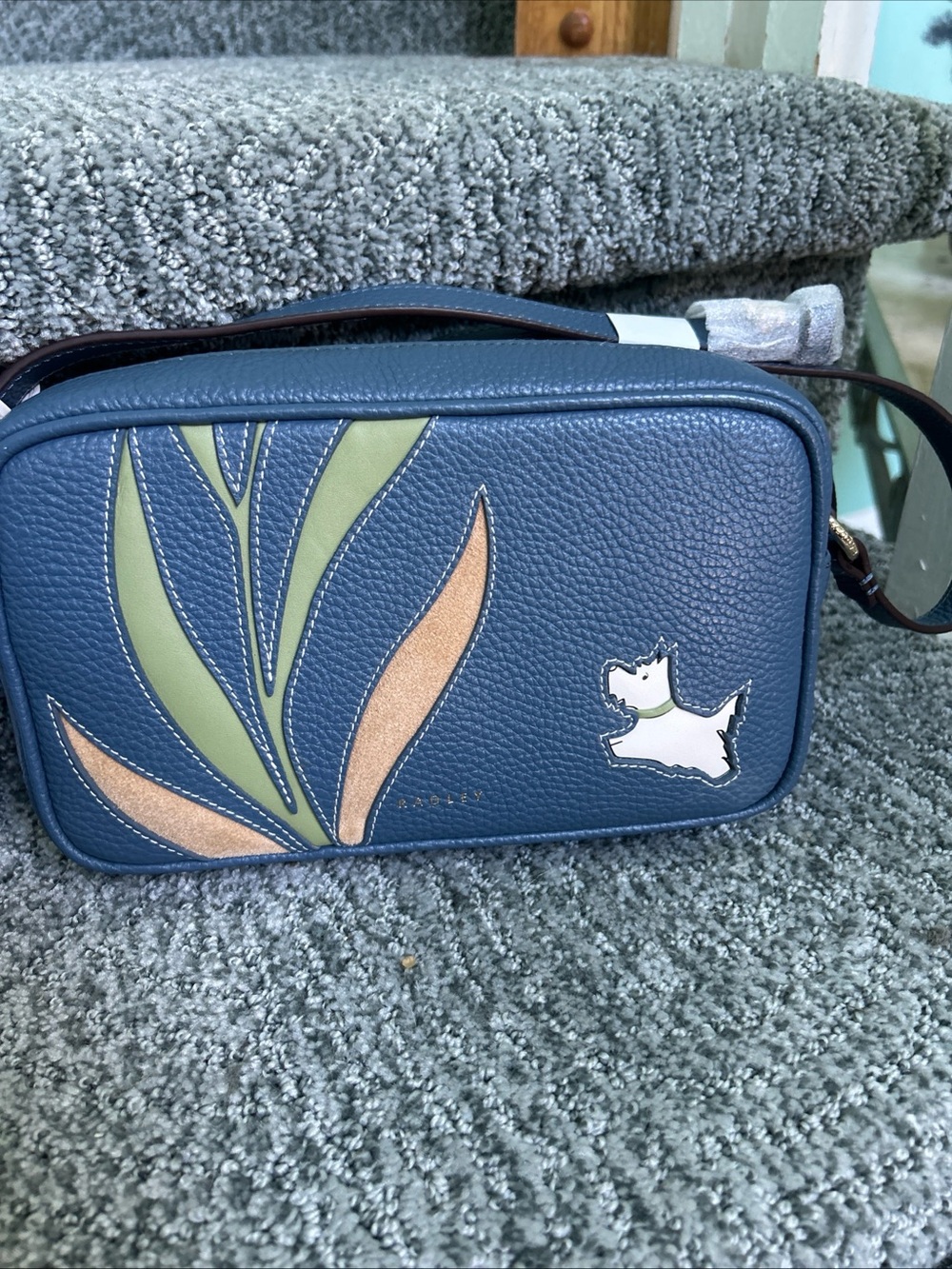 RADLEY LONDON Navy Crossbody with Green and Tan Leaf Appliqué